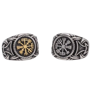 Detailed close-up of retro Viking Vegvisir rings in gold and silver steel finish