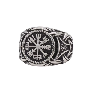 Detail of vintage silver Viking compass ring with intricate Norse Vegvísir engravings