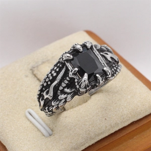 Retro gothic dragon claw ring with black gemstone and engraved stainless steel band