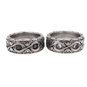 Retro stainless steel rings with hollow carvings and inlaid black and white gemstones