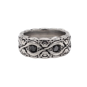 Vintage gothic titanium steel ring featuring hollow patterns and two black round stones