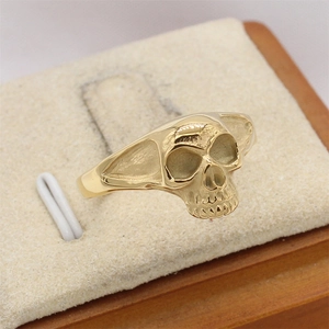 Vintage gothic golden skull ring for men made of polished stainless steel and metal
