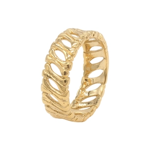 Close-up of gold stainless steel ring featuring a vintage hollow bone texture design