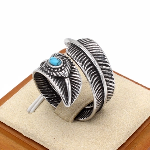 Vintage stainless steel feather bypass ring with oval blue turquoise stone inlay