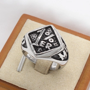 Retro stainless steel biker ring for men featuring a 1%ER embossed diamond-shaped face