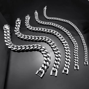 Polished silver stainless steel Cuban chain bracelet set in five different widths