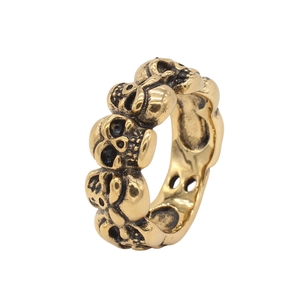 Bague tête de mort vintage en acier titane doré avec finition punk vieillie