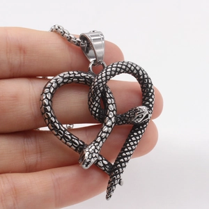 Vintage stainless steel heart pendant necklace featuring twin snakes in punk style