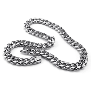 Macro shot of silver polished stainless steel curb chain with large square clasp buckle