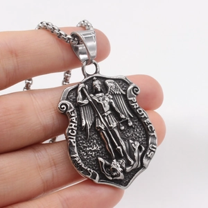 Saint Michael shield pendant necklace in silver stainless steel with angel wing relief