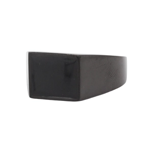 Minimalist matte black square signet ring in titanium steel on a white background