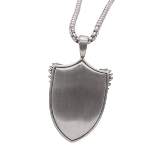 Brushed stainless steel shield pendant necklace with winged edges on a silver box chain