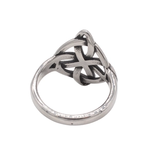 Vintage silver Celtic knot stainless steel ring with oxidized finish on white background