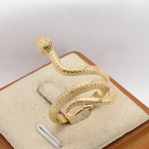 Vintage gold snake ring in stainless steel with detailed scales and spiral wrap design