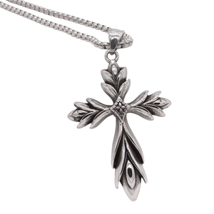 Vintage gothic cross pendant necklace in oxidized steel with intricate floral carvings