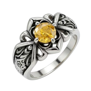 Anello vintage in acciaio inossidabile con cristallo giallo e incisione floreale