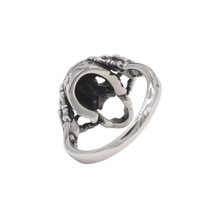 Vintage gothic skull ring in retro silver stainless steel with punk skeletal texture details