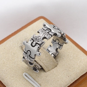 Vintage jigsaw puzzle stainless steel ring for men with polished and textured finish