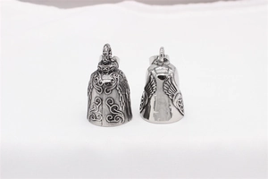 Detailed relief of vintage angel bell pendants in antique black and polished silver finish