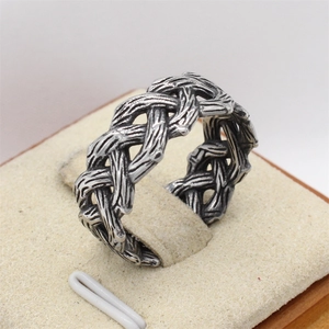 Retro Viking Celtic woven style stainless steel ring with oxidized vintage branch texture