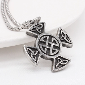 Vintage Viking Celtic cross pendant necklace in antique silver steel on a white background