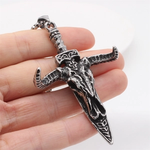Vintage gothic sword pendant with bull skull motif in oxidized stainless steel