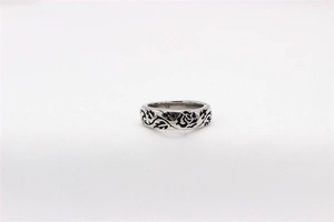 Macro shot of retro rose carvings and S925 hallmark on sterling silver mens ring