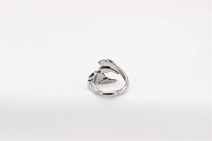 Detailed view of retro silver scorpion ring with intricate punk eagle claw engravings