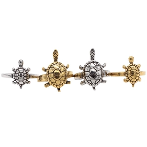 Retro turtle rings set in gold and silver finish with detailed shell texture