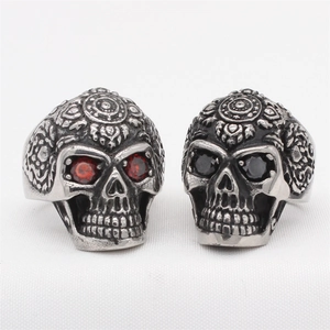 Vintage gothic skull rings in stainless steel with red and black gemstone eyes