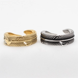 Retro stainless steel feather rings in gold and silver finish with adjustable open band