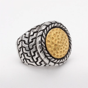 Vintage men's titanium steel ring featuring silver textured band and golden hammered disk