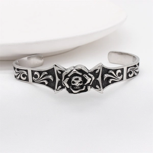 Gothic punk men's open cuff bracelet featuring retro skull and rose floral carvings