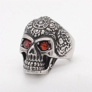 Vintage skull ring for men with red gemstone eyes and gothic floral engraving