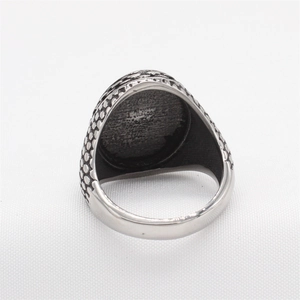 Retro eagle style stainless steel ring for men with intricate scale texture on the band