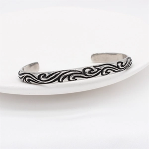 Retro stainless steel open cuff bracelet for men featuring black wave totem patterns