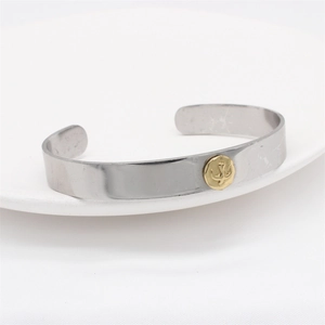 Retro eagle totem silver cuff bracelet with gold emblem and industrial metal finish