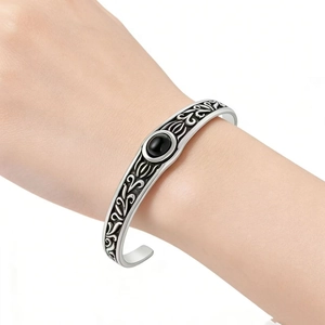Men's vintage titanium steel cuff bracelet with ruby red stone and engraved patterns