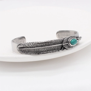 Retro feather-textured stainless steel cuff bracelet with turquoise stone in silver finish