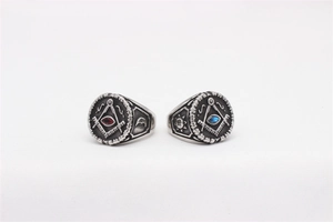 Detailed relief of sun and moon symbols on vintage Masonic stainless steel rings