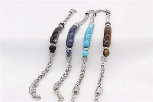 Detail view of four tiger eye and stone bracelets with polished steel tube beads