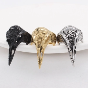 Vintage Viking raven skull rings in black gold and silver finish with Celtic knot engravings
