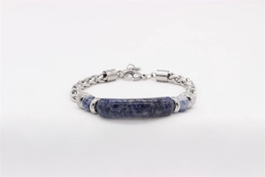 Detail of blue natural stone bead with braided silver wheat chain and lobster clasp