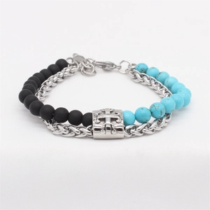 Double-layer beaded cross bracelet featuring matte black beads and turquoise accents