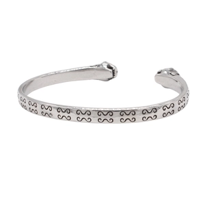 Vintage stainless steel open bangle featuring 3D tiger head design and leaf engravings