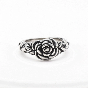 Vintage rose flower ring in retro silver steel with intricate vine leaf textures