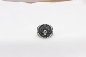 Detailed top view of retro gothic stainless steel ring with skull and masonic symbols