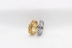 Detail of Celtic knot woven spinner rings in gold and silver stainless steel