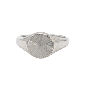 Polished silver titanium steel signet ring with engraved sunburst motif on a white background