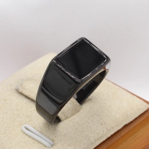 Minimalist black rectangular stone signet ring for men in polished stainless steel finish